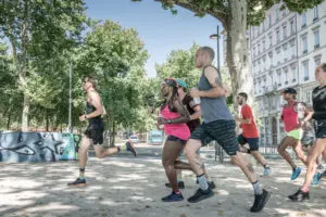A photograph of people running