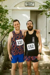 A photo of two men in running gear