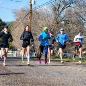 A photo of people running