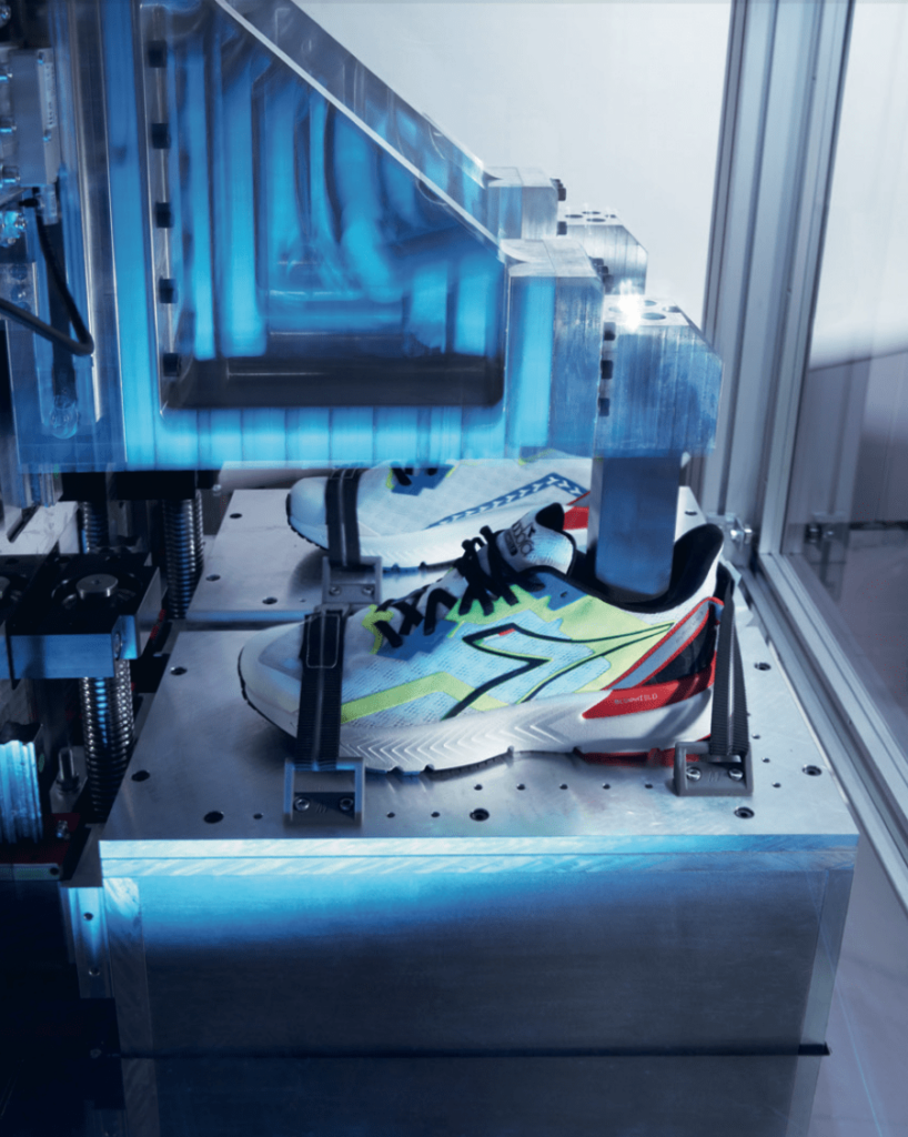 A photograph of shoes being made at the Diadora factory