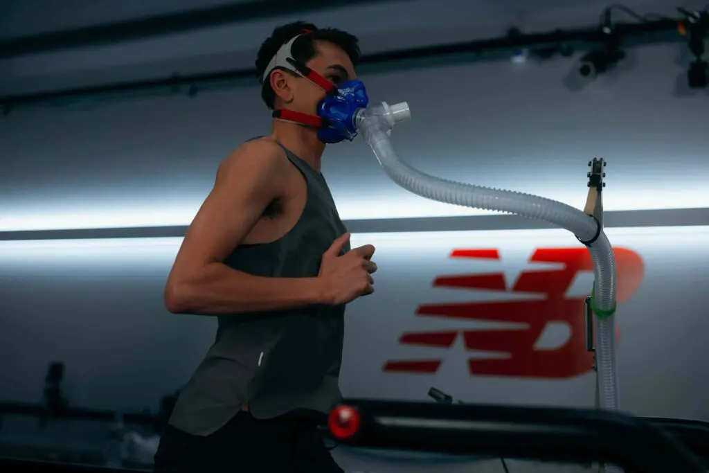 A photo of Alex Yee on a treadmill doing a V02 max test