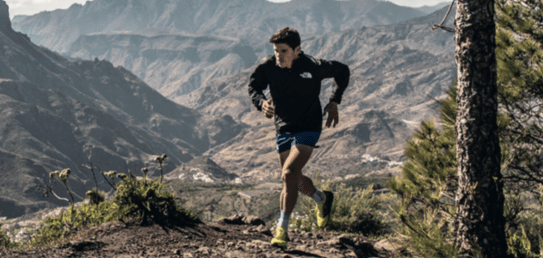 A photo of a man running the The North Face Transgrancanaria