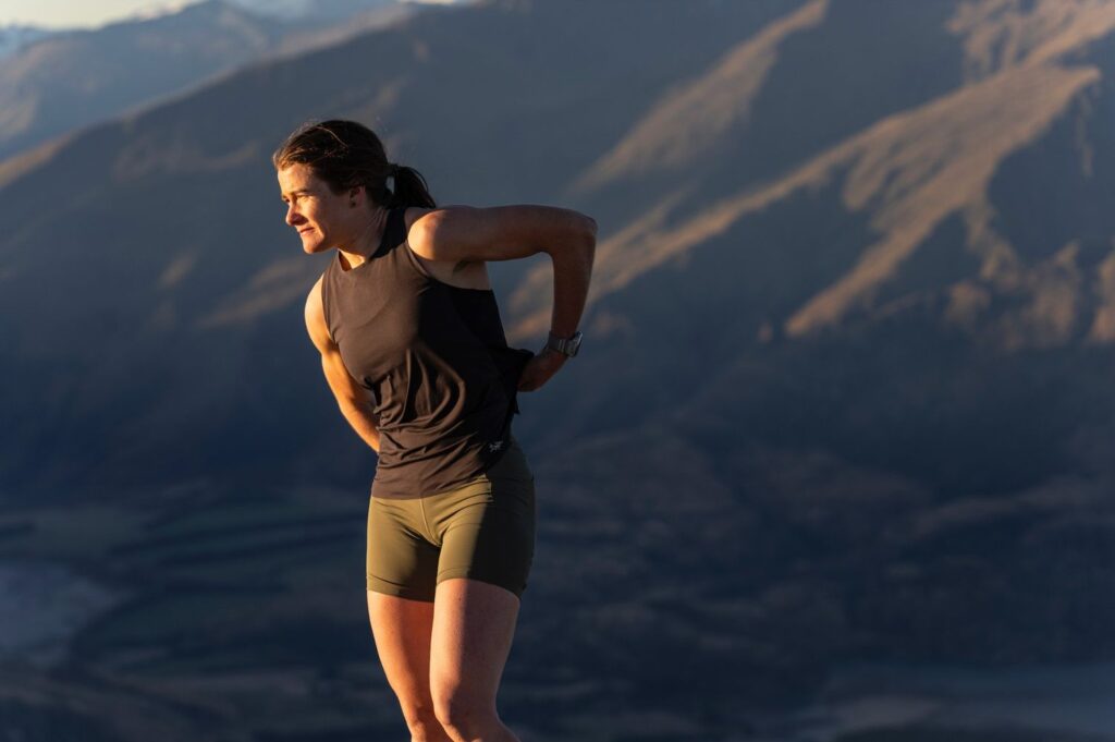 A photograph of a woman in the mountains 